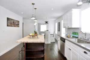 Spanish, bungalow, black and white, Hollywood, interior design, urchin light, black, Spanish tiles, tile, vintage, white kitchen, house flip, Marilynn Taylor