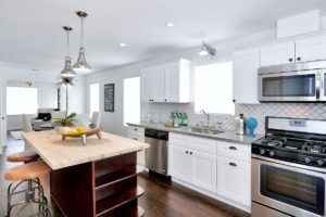 Spanish, bungalow, black and white, Hollywood, interior design, urchin light, black, Spanish tiles, tile, vintage, white kitchen, house flip, Marilynn Taylor