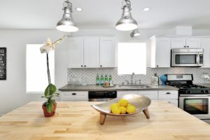 Spanish, bungalow, black and white, Hollywood, interior design, urchin light, black, Spanish tiles, tile, vintage, white kitchen, house flip, Marilynn Taylor