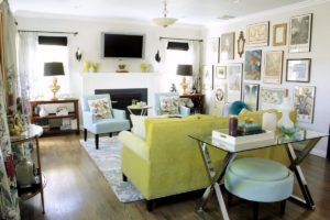 A Living room wall filled with the photo frames